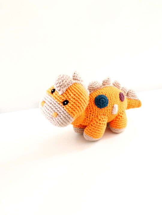 Dinosaurier Organic Pebblechild Rattle – Steggi Soft Orange 1